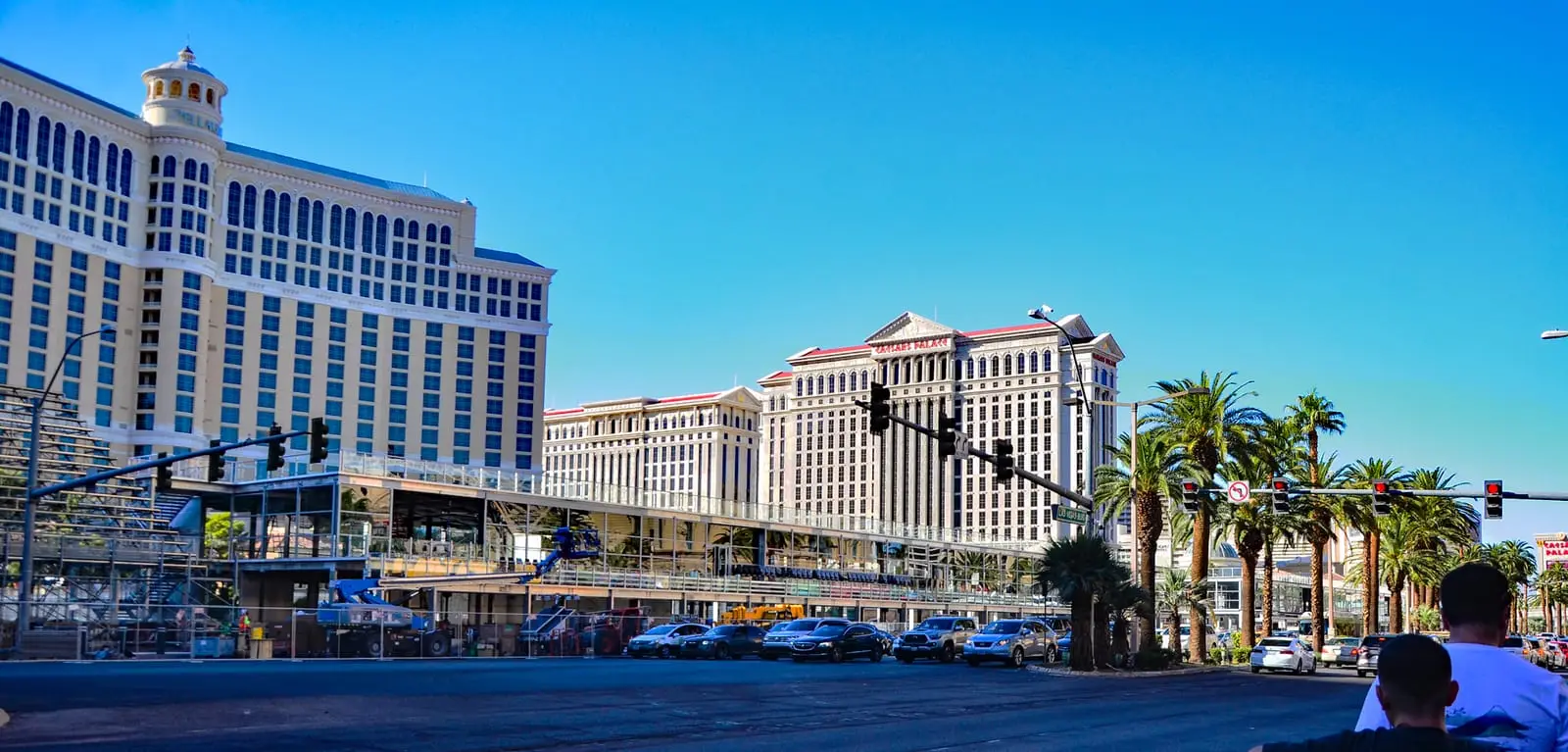 Temporary race-week grandstands and hospitality being built on the Strip in front of the Bellagio, with Caesars Palace behind, in 2023.