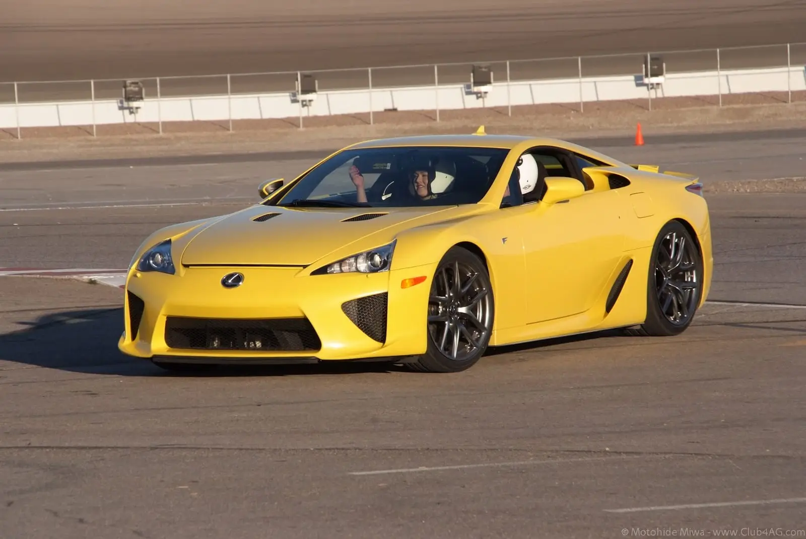 A yellow Lexus LFA on track at Las Vegas Motor Speedway.