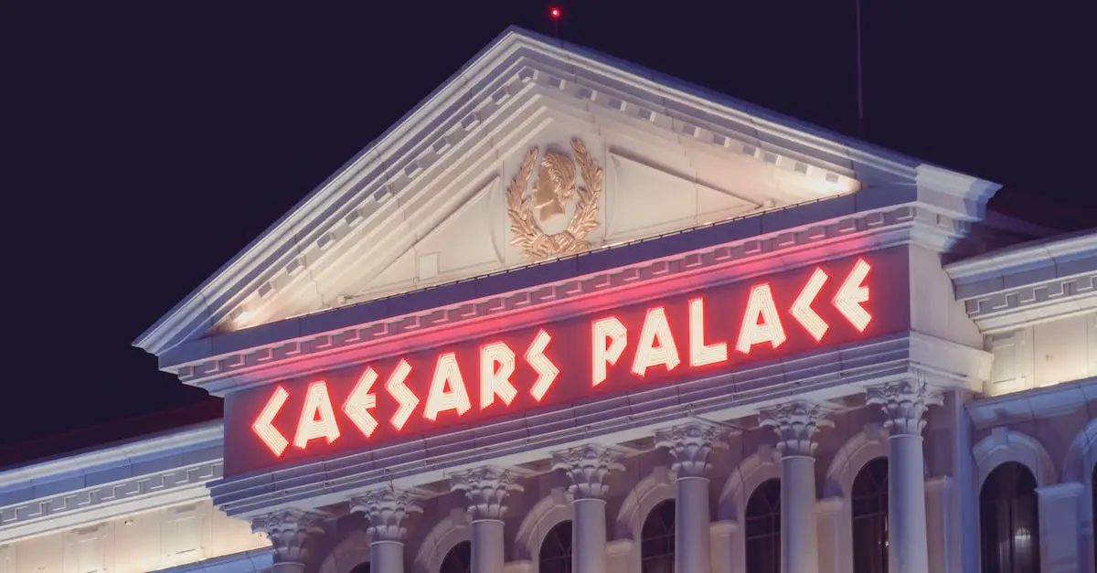 The illuminated Caesars Palace sign on the Las Vegas Strip