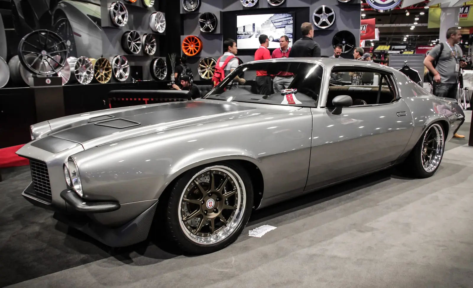 A silver restomod muscle car on display at the SEMA Show in Las Vegas.